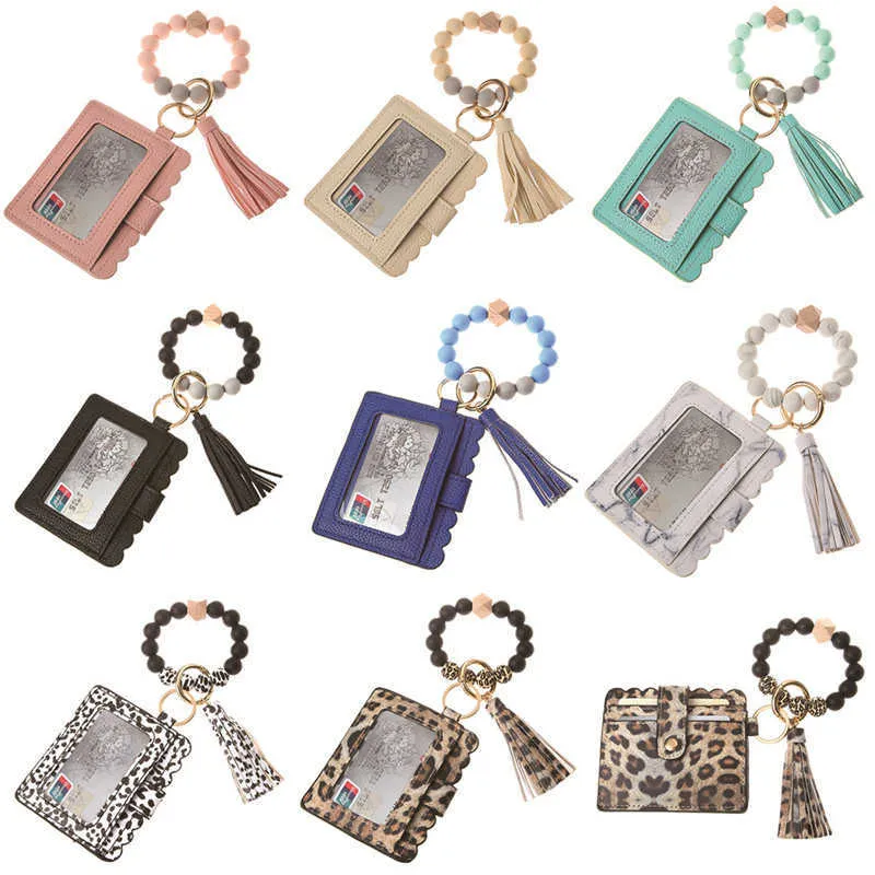 Save Big on Bulk Multi Ring Keychain 2021 Hot Multiful Keychain Wood Beads  Key Ring And Card Wallet PU Leather O Key Ring With Matching Wristlet Bag 