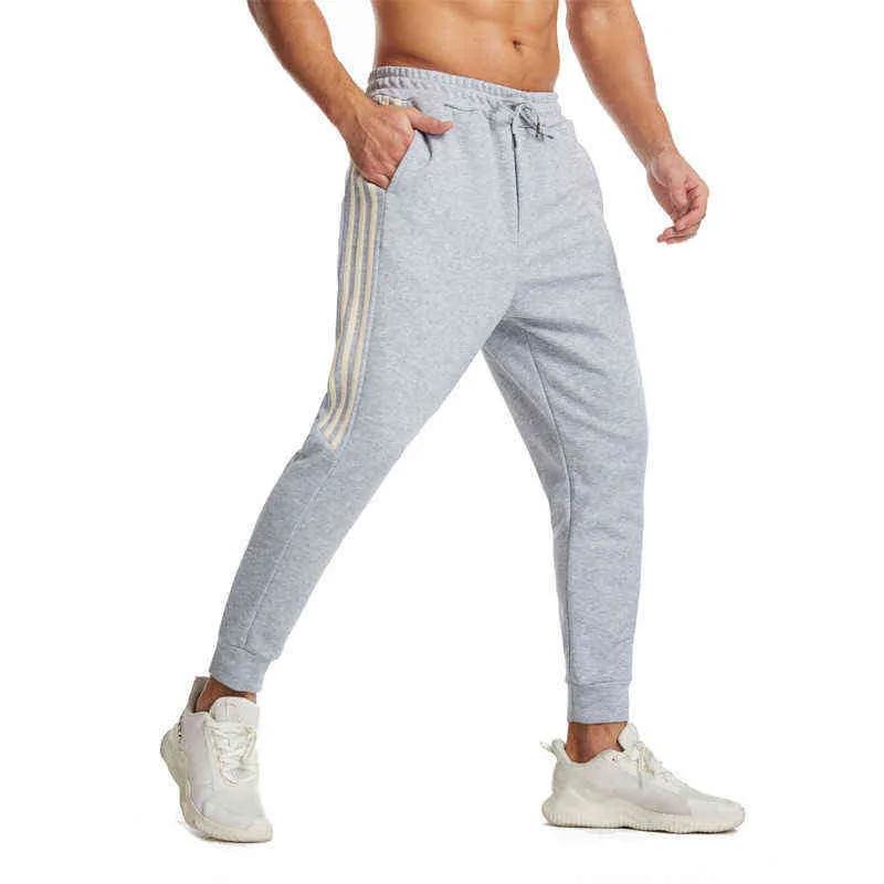 Taglie forti Pantaloni sportivi larghi da uomo tinta unita Pantaloni casual a figura intera Pantaloni da jogging sportivi da palestra Y220308