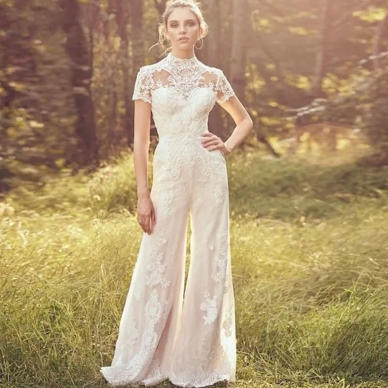 Eleganti tute in pizzo Abiti da sposa Sposa Abiti da ricevimento formale Vintage Personalizza Pantaloni Abito da sposa Abito da sposa Tasche Manica corta Collo alto 2022