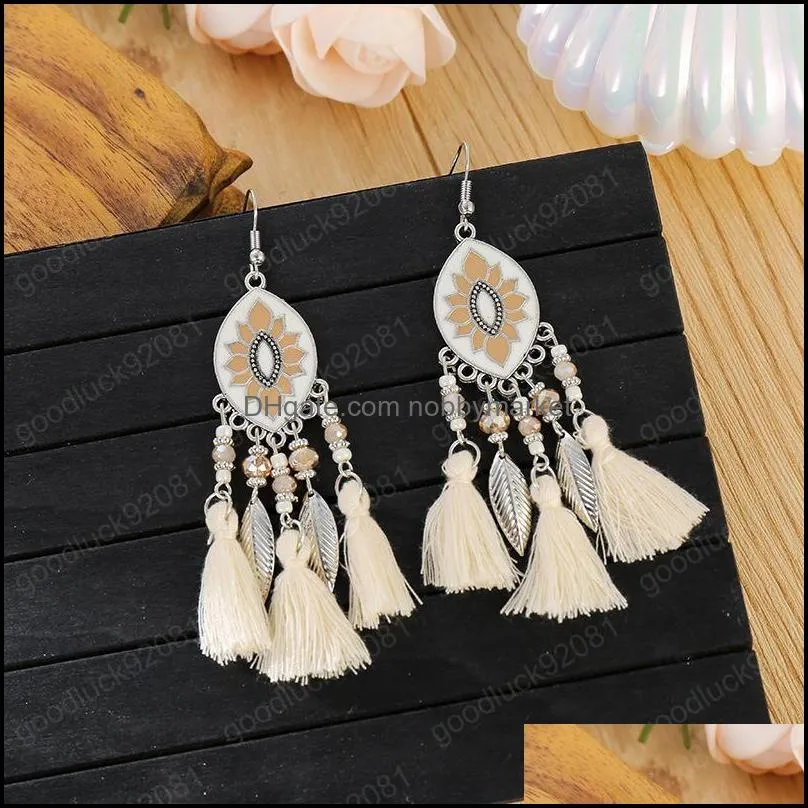 New European and American metal drop oil twin flower ancient style tassel earrings bohemian metal rice bead earrings retro style