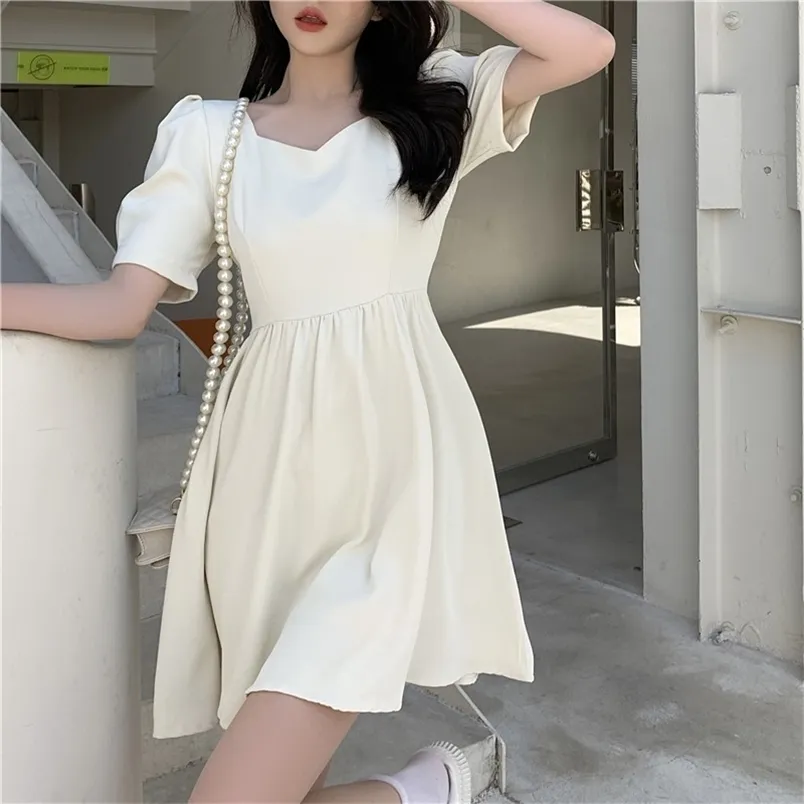 Mini abito sexy con fiocco senza schienale dolce estivo coreano casual vintage ragazza manica a sbuffo slim solido partito 210519