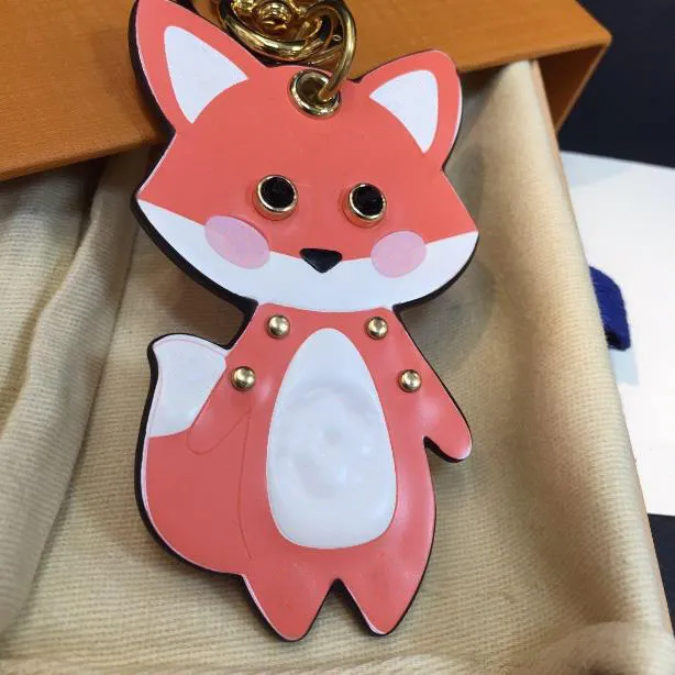 Persoonlijkheidsontwerp Fashion Little Fox Rat Keychain Leuke unisex sleutelhanger leer met roestvrijstalen sleutelhanger charme sleutelhanger met geschenkdoos