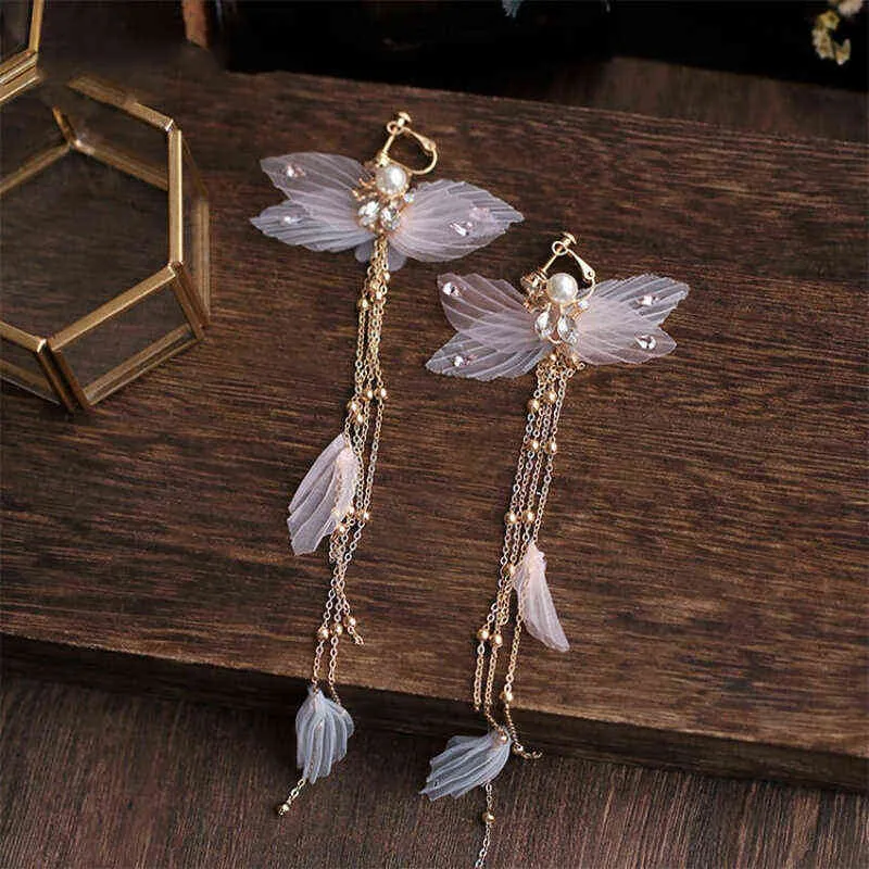 Lion Head Sen Department Xianmei Hanfu Tocado Super Fairy Flow Su Bu Yao Joyas para el cabello Pendientes Par antiguo Clip Foto de boda