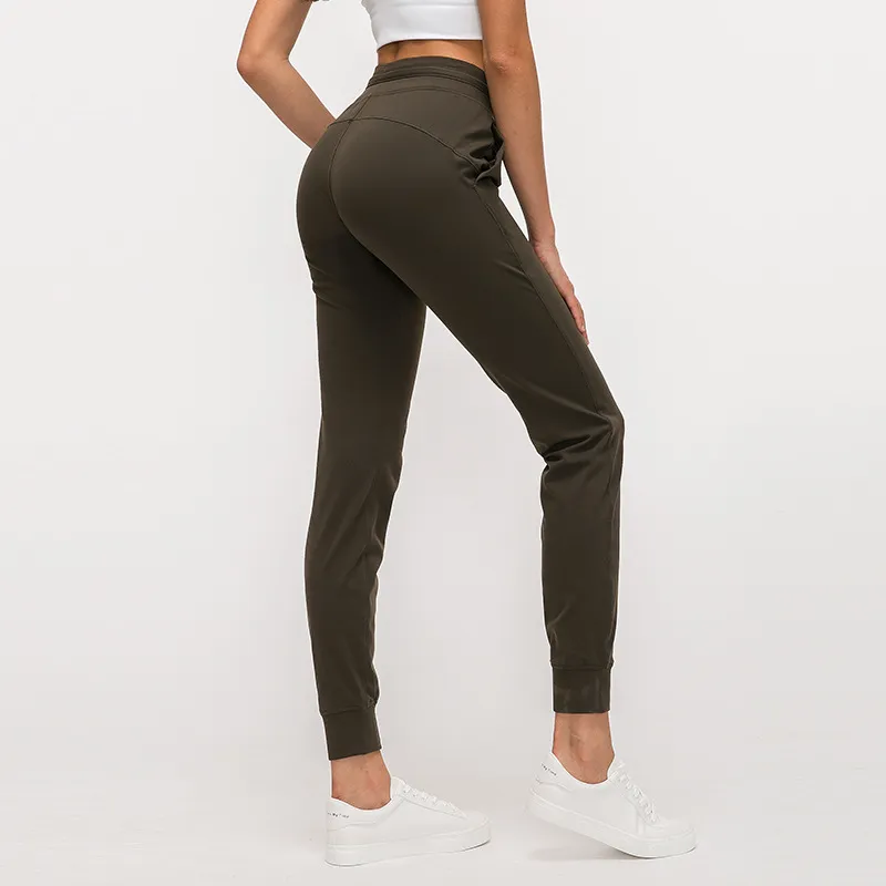 L-31 Pantalones de chándal para mujer al aire libre, pantalones de yoga para fitness, pantalones de correr delgados y delgados con bolsillos delanteros, pantalones de chándal informales, sueltos y rectos B232u