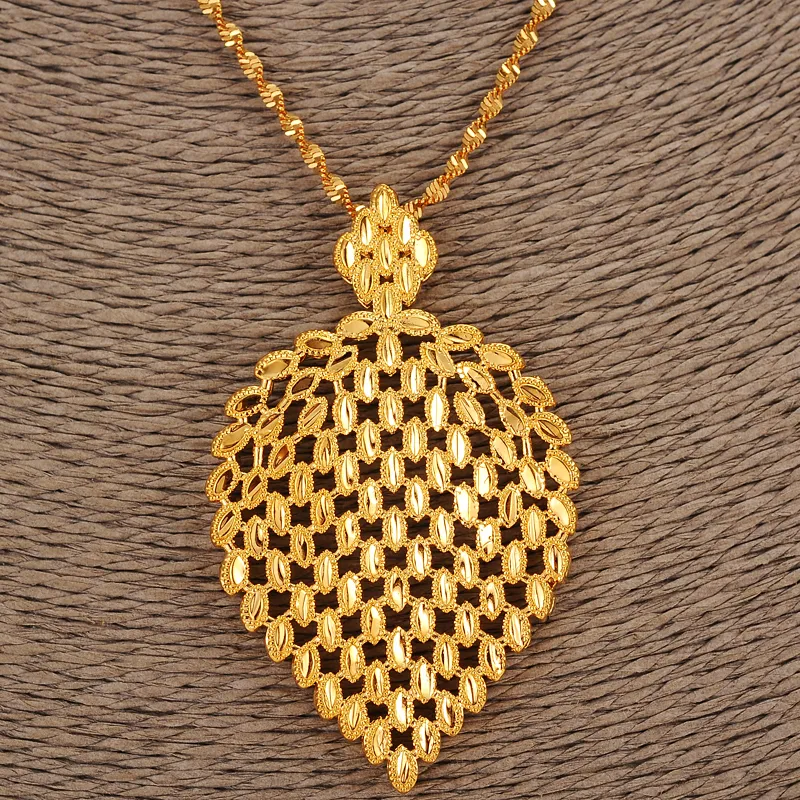 Дубайские женщины павлин шлейф кулон ожерелье 18к желтый G / F твердое золото толстые ювелирные изделия Африка / арабские красивые подарки листьев тяжелые