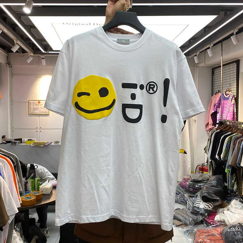 T-shirt da uomo Ins estate super calda nuovo prodotto schiuma volto sorridente stampa alfabeto coreano T-shirt da uomo e da donna in cotone sciolto a maniche corte