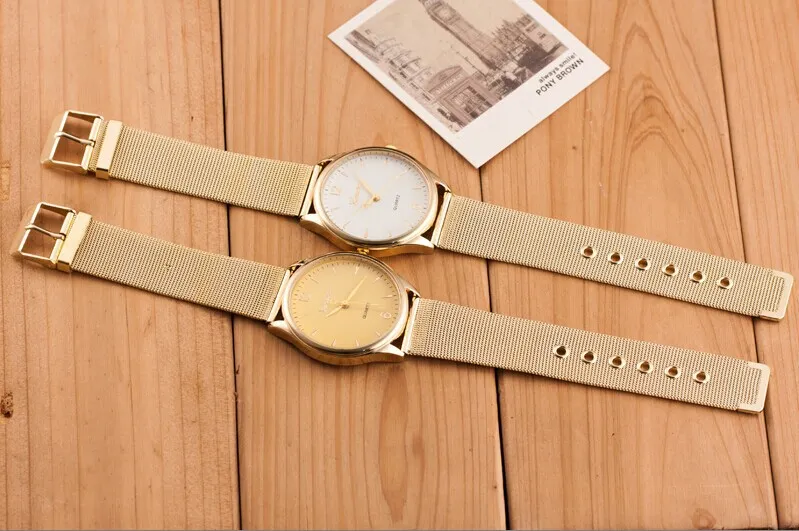 Mulheres Genebra Relógios Mais Novo Liga Malha Cinto Cool Assista Preço de Fábrica Golden Band Ladies Quartz WristWatch