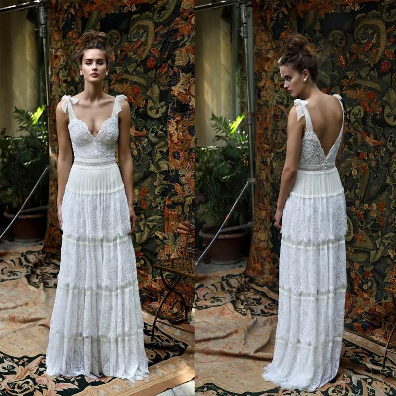 Lihi Hod Lace Brudklänningar Spaghetti Neckline Tiered Backless Bröllopsklänningar Anpassad Golv Längd Robe de Mariée