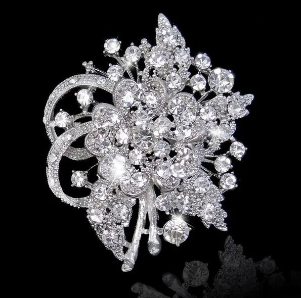 Silver brooch for dress deals