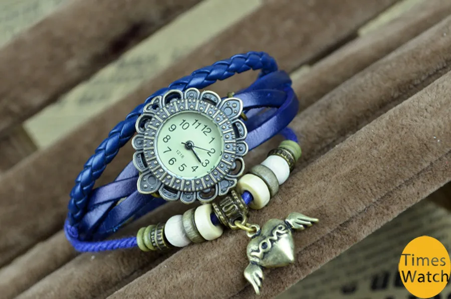 orologio stile vintage Nuovo arrivo Moda vintage retrò in rilievo braccialetto di corda intrecciata avvolgere le donne dell'orologio da polso in pelle di mucca al quarzo