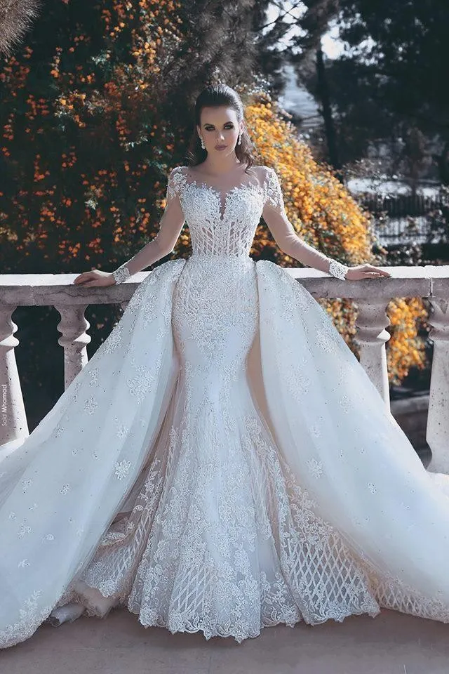 2018 New Backless Mermaid Lace Wedding Dresses With Detachable Train Long Sleeves Beaded Tulle Overskirt Dubai Arabic Bridal Gowns