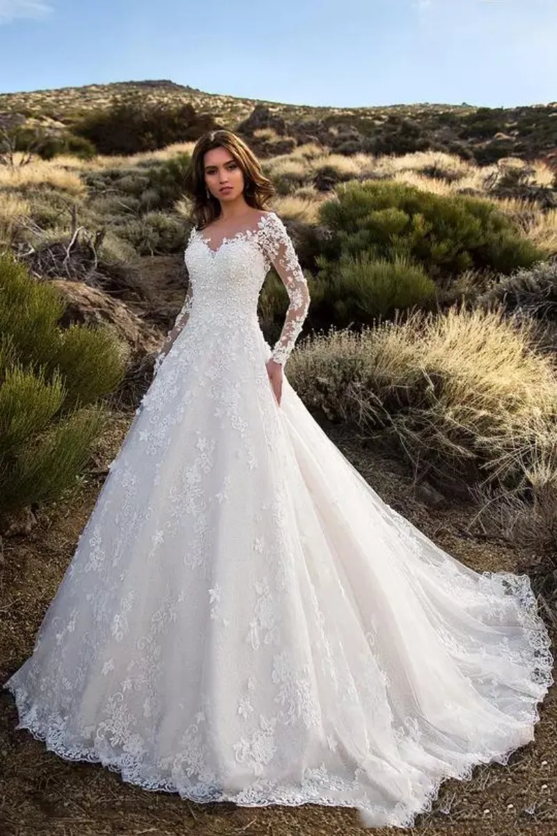 Long Sleeve Lace Appliqued Long Sleeve wedding dresses with Pockets and Sheer Jewel Neckline - Modest and Backless Bridal Gown for Garden and Country Long Sleeve Lace Appliqued Long Sleeve wedding dresses with Pockets and Sheer Jewel Neckline - Modest and Backless Bridal Gown for Garden and Country