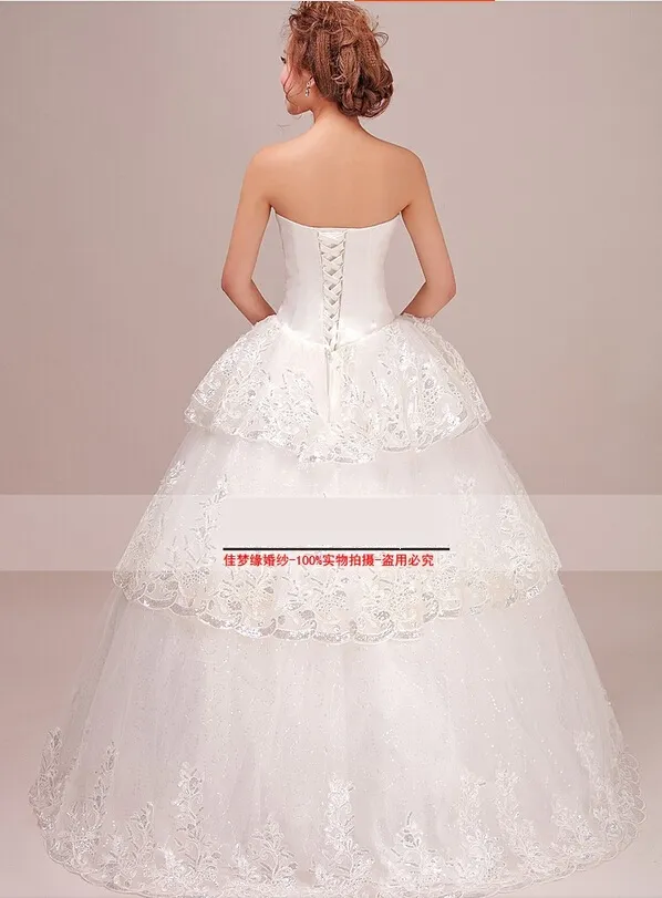 Najnowszy luksusowe sukienki ślubne z kryształami Backless Line Długość podłogi Lace Bling Cavered Ivory Suknie ślubne