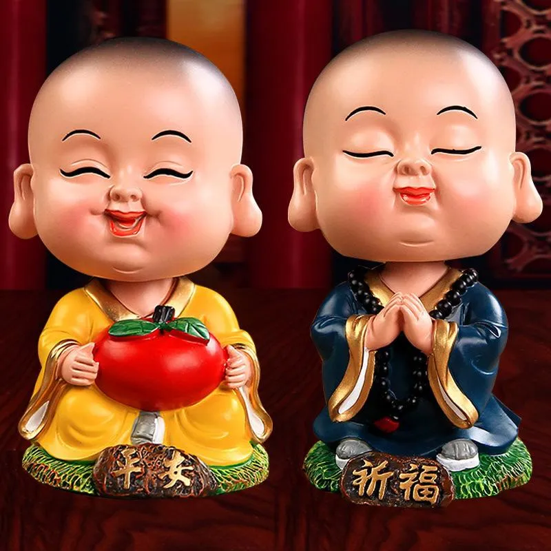 The car shook his head monk doll interior ornaments lovely Maitreya Buddha resin crafts Home Furnishing creative ornaments Home creative art