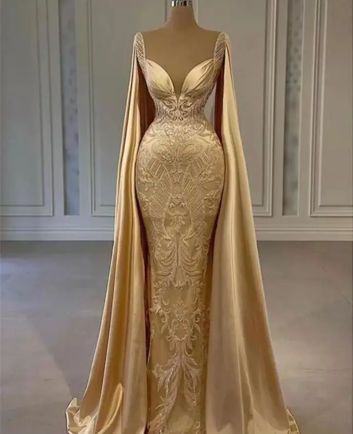 Guld Champagne Sjöjungfru Balklänningar med lång Cape Wrap Pärlstav Spets Applikerade arabiska Queen Kvällsmottagning klänning robes de soir￩