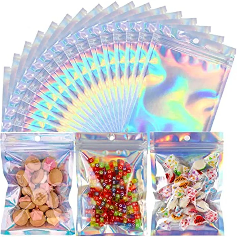 100pcs / lot pochette en aluminium sacs d'emballage en plastique sac de rangement refermable à fermeture éclair holographique avec trou de suspension pour collation alimentaire
