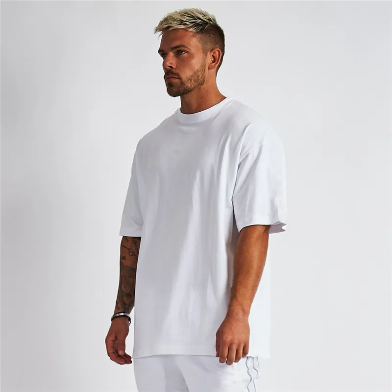 T-shirt oversize tinta unita da uomo Palestra Bodybuilding e fitness T-shirt casual stile di vita allentata T-shirt uomo streetwear Hip-Hop T200219