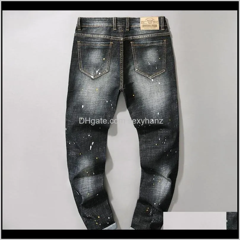 trend new embroidery yellow butterfly spray paint wave point slim tight straight men`s jeans hole trousers