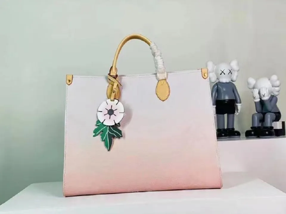 2021 ONTHEGO GM handbag Luxury designer bag wallet High quality leather twist handbags Ladies single shoulder diagonal bags Clutch coin purse