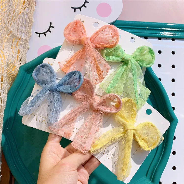 Nuevo coreano dulce niña princesa Simple pequeño fresco lunares lazo de hilo Clip de pico de pato moda niños horquillas accesorios para el cabello