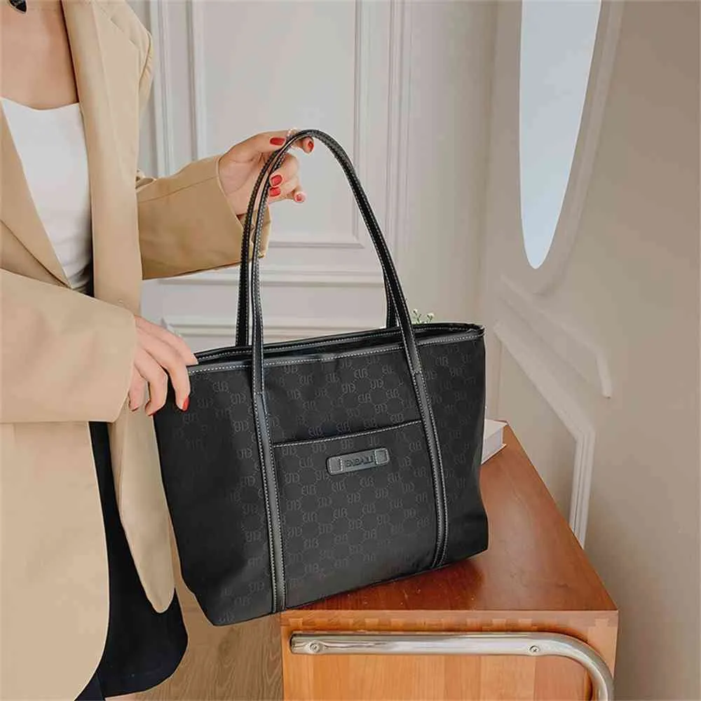 borsa di stoffa di nylon portatile nuova moda stampa valigetta lavoro per il tempo libero pendolarismo una borsa borsa a tracolla vendita di liquidazione del Black Friday