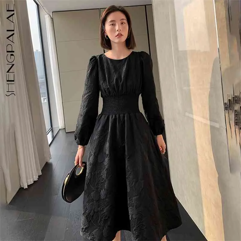 Mid length black on sale dress with sleeves