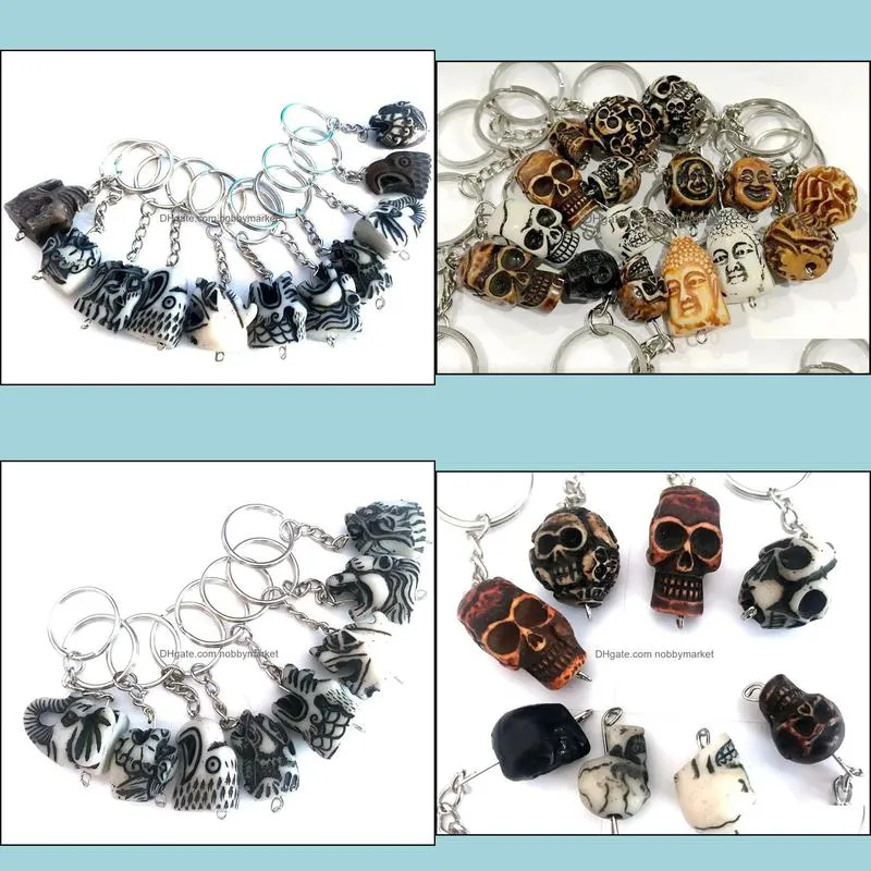 100 pcs biker keychain mixed totem cool men`s jewelry rock key ring