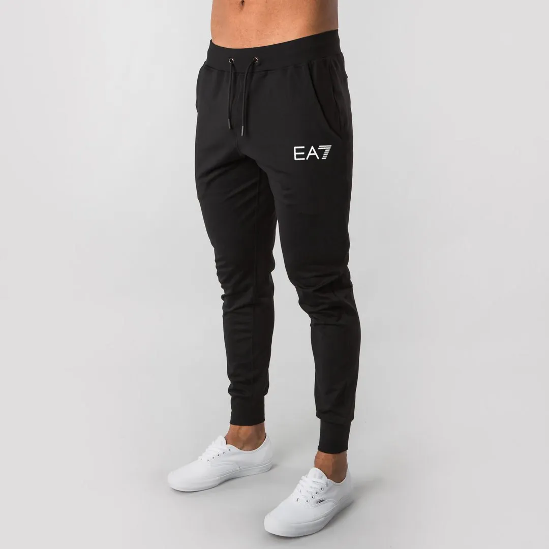 Nuovi pantaloni da jogging da corsa Pantaloni da jogging da bodybuilding in cotone morbido da uomo Pantaloni lunghi Harem Pantaloni da allenamento sportivi da fitness