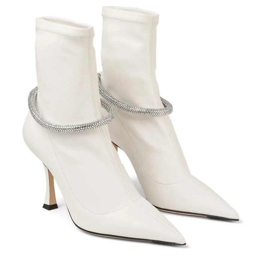 Лучшие роскоши Leroy Boots Boots Женские заостренные носки носок с кристальному украшению Высокие каблуки роскошный бренд леди вечеринка свадебное платье