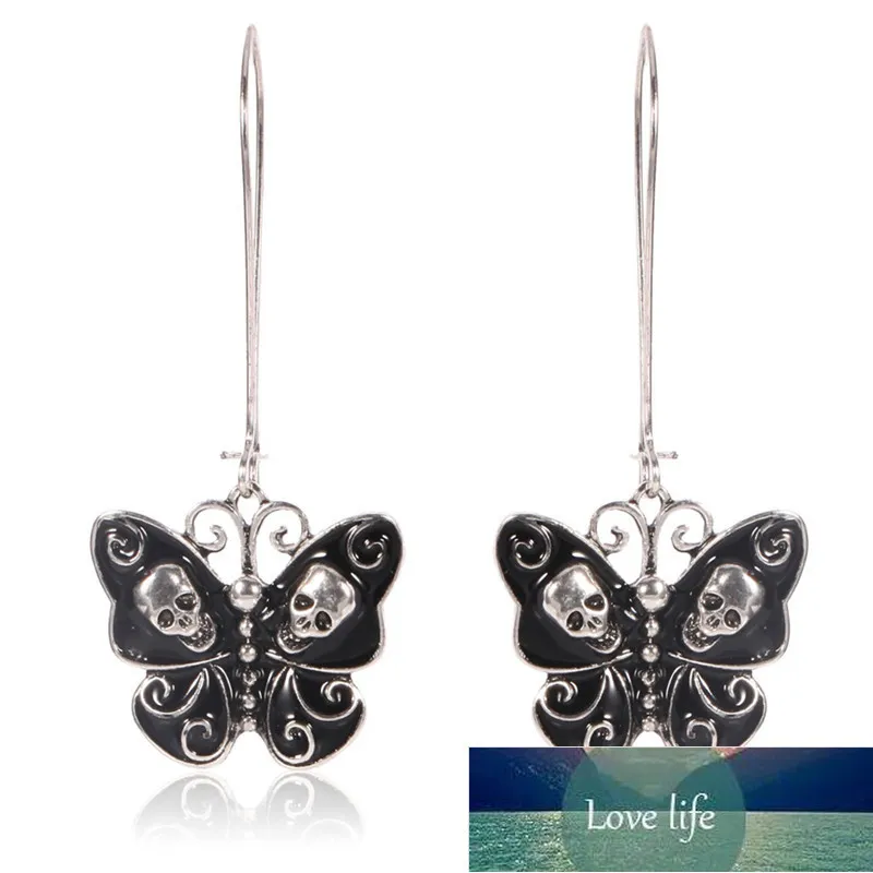 1Pair Womens Vintage Bröllopsfest Öron Smycken Tillbehör Punk Gothic Butterfly Skull Dangle Örhängen För Kvinnor Lady Fabrikspris Expert Design Kvalitet Senaste