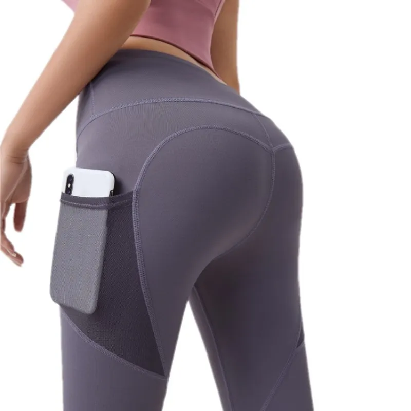 Pialli da corsa in vita alta da donna Leggings Pantaloni da yoga La tasca laterale Scrunch Tammunzione Calce Solleva