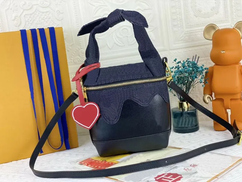 Alta Qualidade Saco Cosmético de Mulheres Moda Denim Carta Impressão de Couro De Couro Bolsa De Ombro Messenger M45970 Zipper Luxury Show Party 28 * 23x10cm