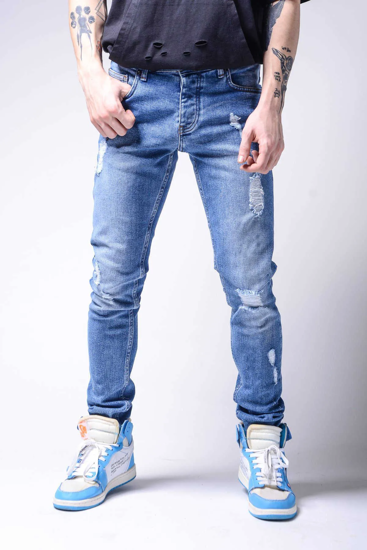 Męskie Slim Fit Elastyczny Otwór Moda Dżinsy Nowa Moda Slim Ołówek Spodnie Casual Hole Ripped Design Streetwear Jeans X0621