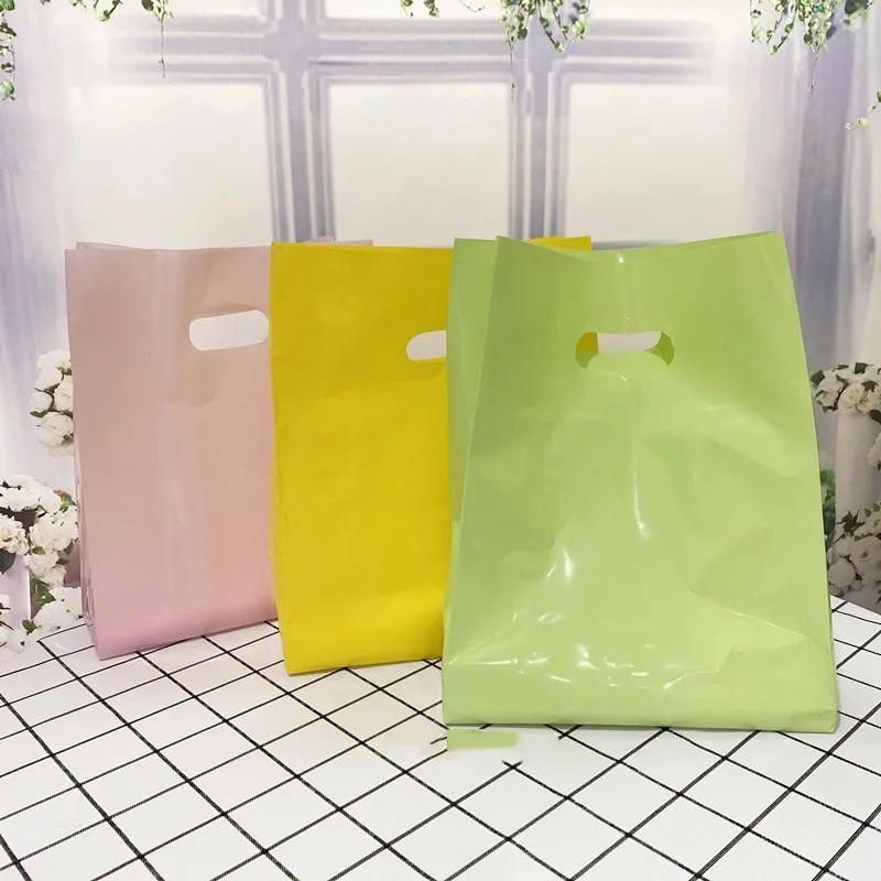 50pcs Thick 15x25x3cm Solid color Jewelry Packaging Bags Shopping Plastic Gift Bag with Handle