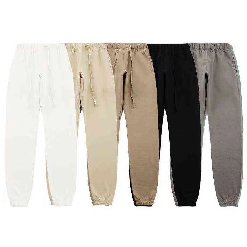 Calças itens essenciais com homens reflexivos designer Pant Pant Spring Autumn Sports Running Jogger Tamanho do tracksuit de tamanho grande S-XL