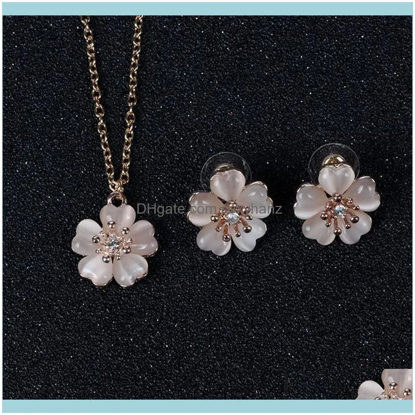 Sets sieradencute vrouwelijke witte maansteen sieraden set charm gouden kleur stud oorbellen voor vrouwen luxe kristal bloem bruiloft ketting ketting