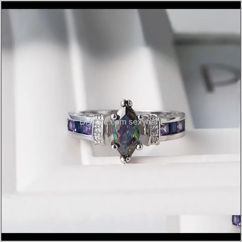 Band sieraden drop levering 2021 hoge kwaliteit prachtige metalen kleurrijke elliptische zirkoon ring vrouwelijke tij groothandel supply mode ringen i8krb