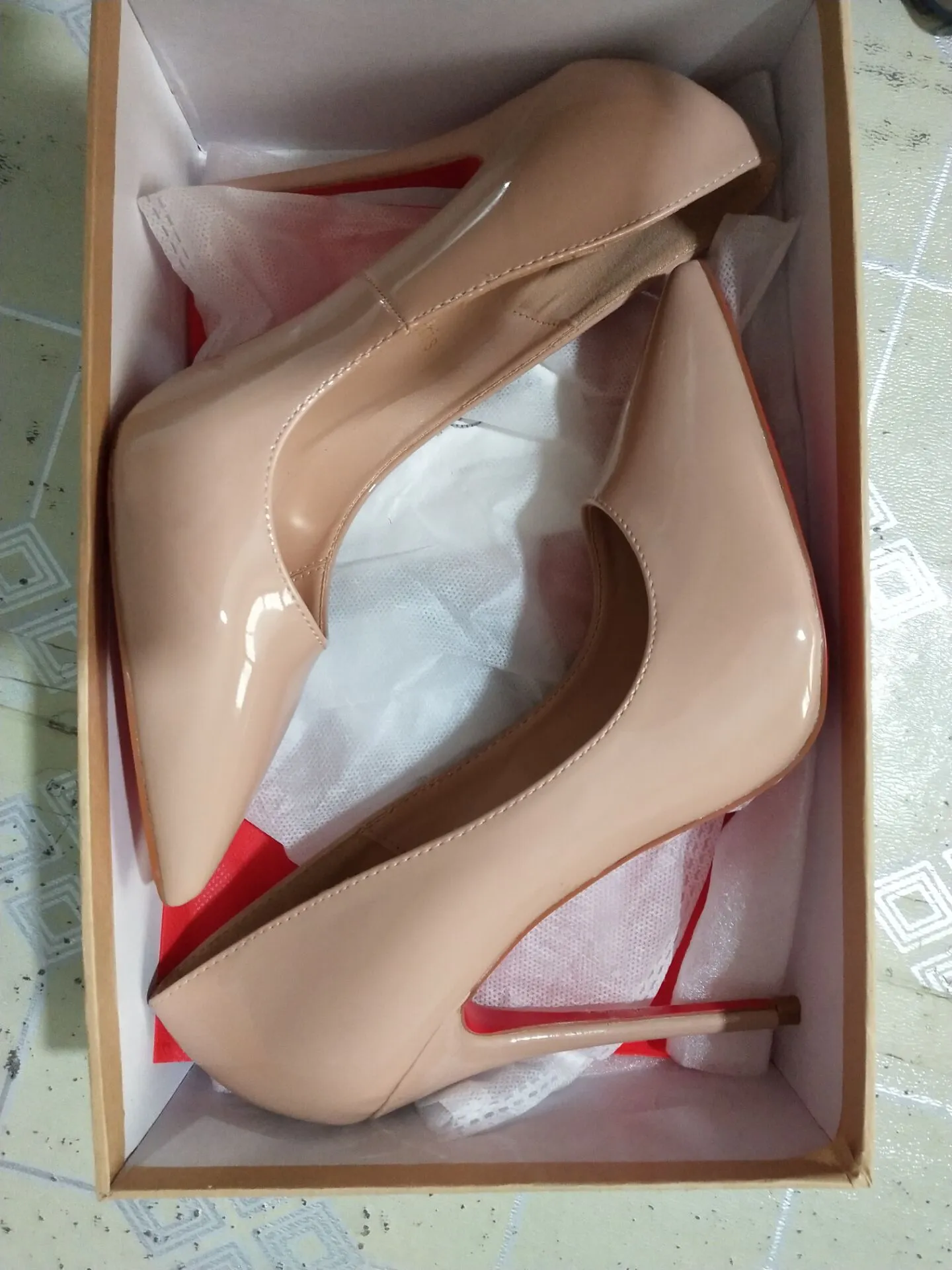 Sold at Auction: CHRISTIAN LOUBOUTIN 