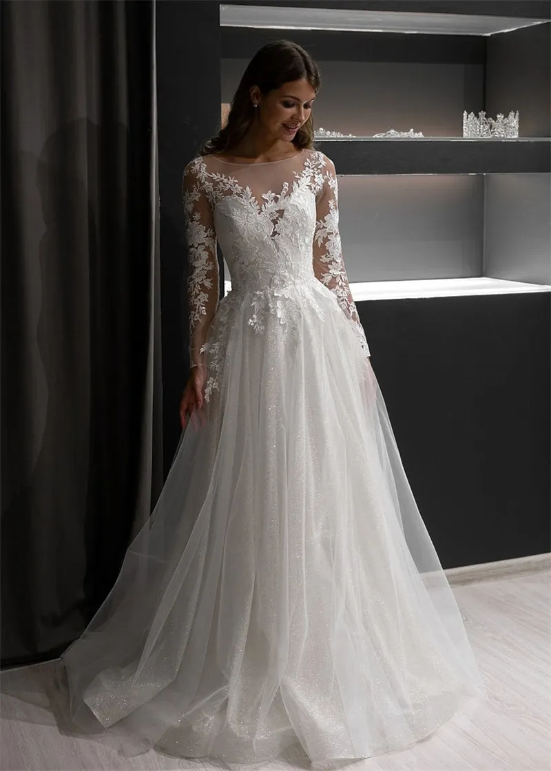 Incredibile abito da sposa in tulle con paillettes a maniche lunghe a linea illusione Abiti da sposa con bottoni posteriori