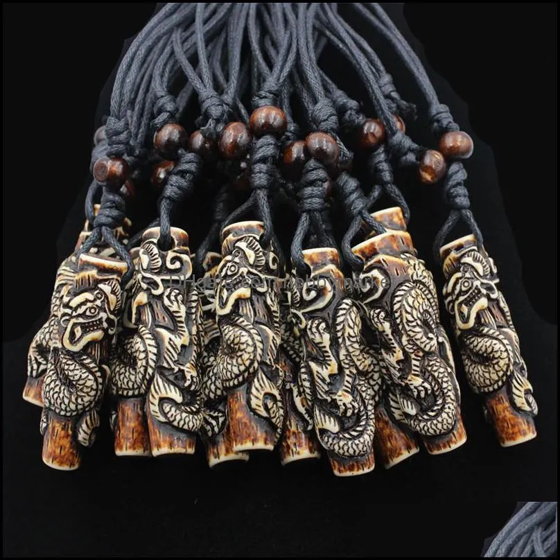 Hängsmycke Halsband Hängsmycken Smycken Lotter Partihandel 12st Cool Boy Mens Simation Bone Carving Totem Dragon Wood Beads Amet Halsband Lucky Gi