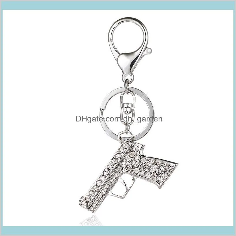 Fashion Sier Colore Aragosta Chiusura Anelli Ciondola Strass Gun Charm Portachiavi in metallo per uomo Accessori chiave Drop Delivery 2021 Kyeli