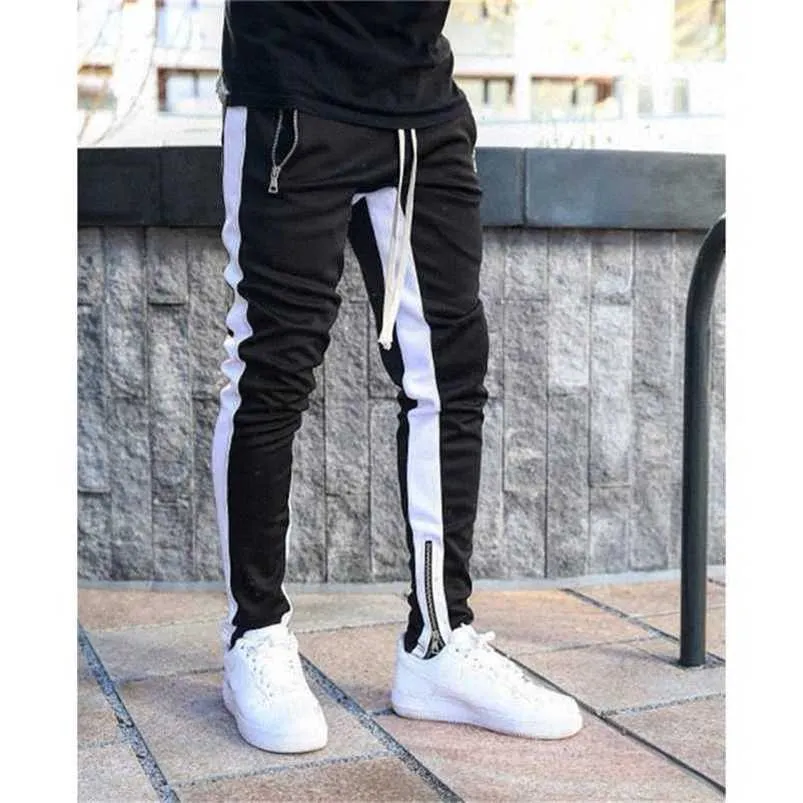 Men Jogger Pants Fitness Bodybuilding Gym Long Pants Spring Autumn Side Stripe Zippered Casual Fashion Men Sweatpants Trousers 211110