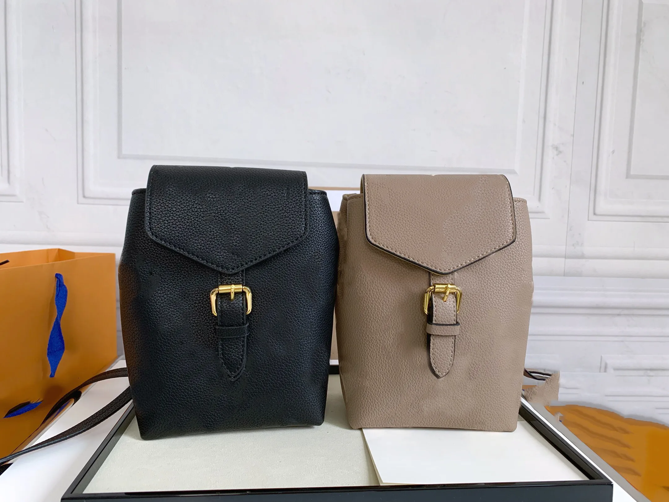 Designer Womens Mini Leather Backpack High Quality Mini Clutch Handbag With  Crossbody And Shoulder Straps, Wallet Included From Zhouzhoubao123, $52.56