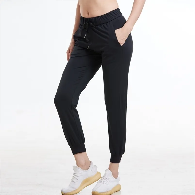 Vrouwen stretchstoffen Losse pasvorm Sport Actieve Skinny Leggings met twee zijzakken Camo Enkle-length Broek 211216