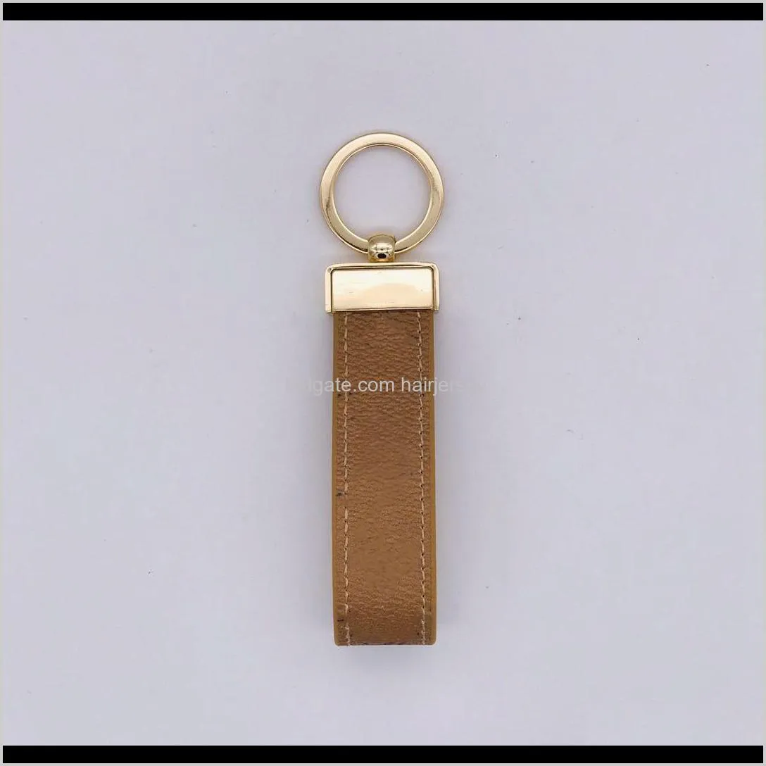 unisex fashion keychain with box and dust bag 2021 designer handmade key chains 4 colors purse bags key pendant buckle accessories