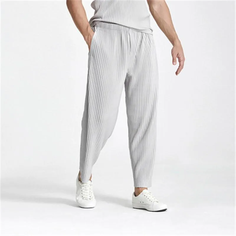 Pläterad Casual Straight-Ben Harem Byxor Trendig Fashion Loose and Comfortable Nine-Point Running Track