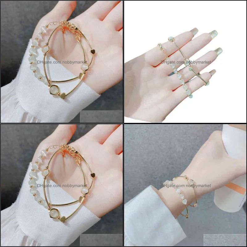 Net red Korean cat`s eye two-piece set temperament overlapping Bracelet female cool wind Beaded Jewelry