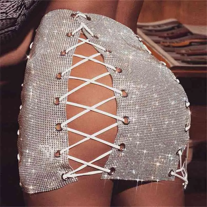 Luxury Glitter Metal Crystal Diamonds Kjolar Kvinnor Hollow Out Lace Up Sexig Clubwear Nattklubb Mini Skirt 210619