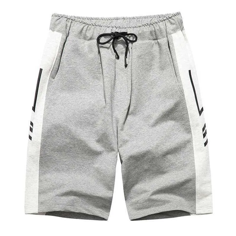 Mannen actieve atletische prestaties losse pasvorm shorts met pocket masculino katoen elastische taille trekkoord korte broek DK09 210527