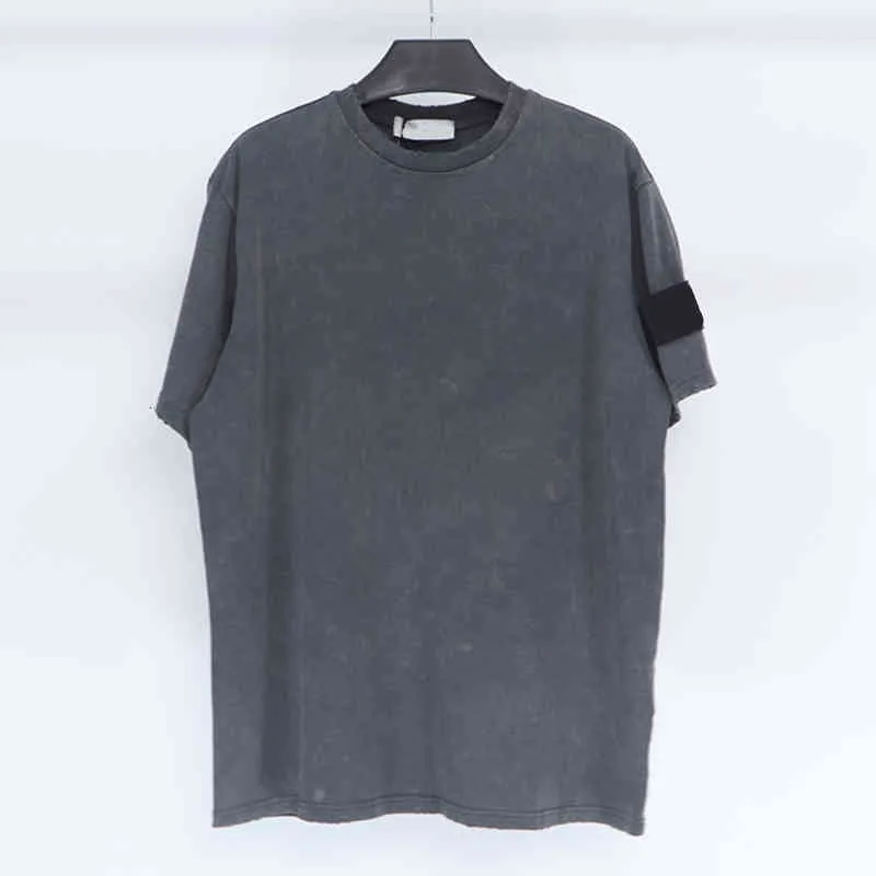 Stone Summer Crew Neck Old With Holes T-shirt da uomo Marchio di moda europeo e americano Allentato semplice coppia maniche corte Badge T-shirt per uomo